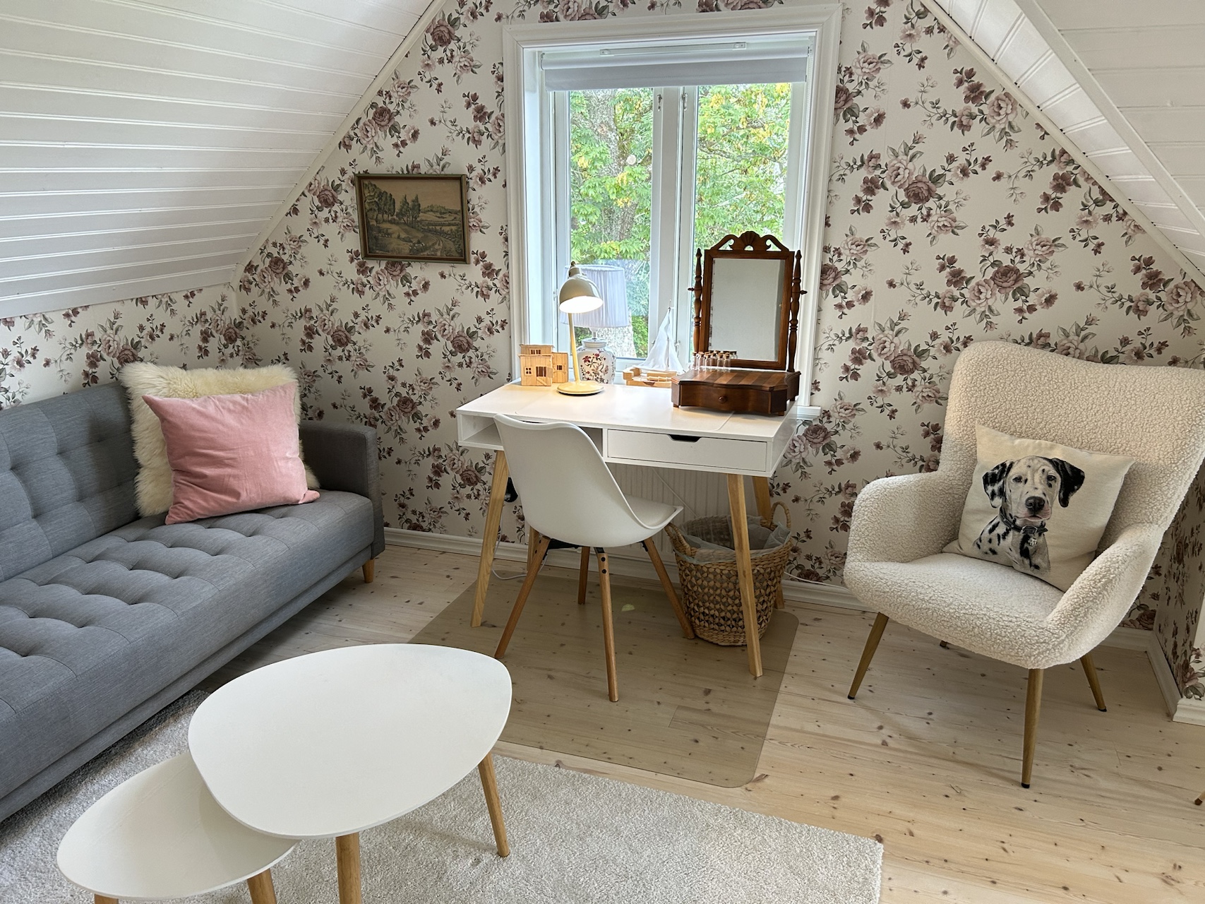 Bedroom two sitting area with sofa, armchairs and a desk by the window