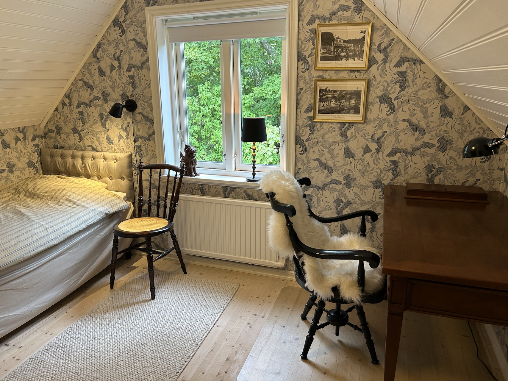 Bedroom three with a bed, chairs and a writing desk