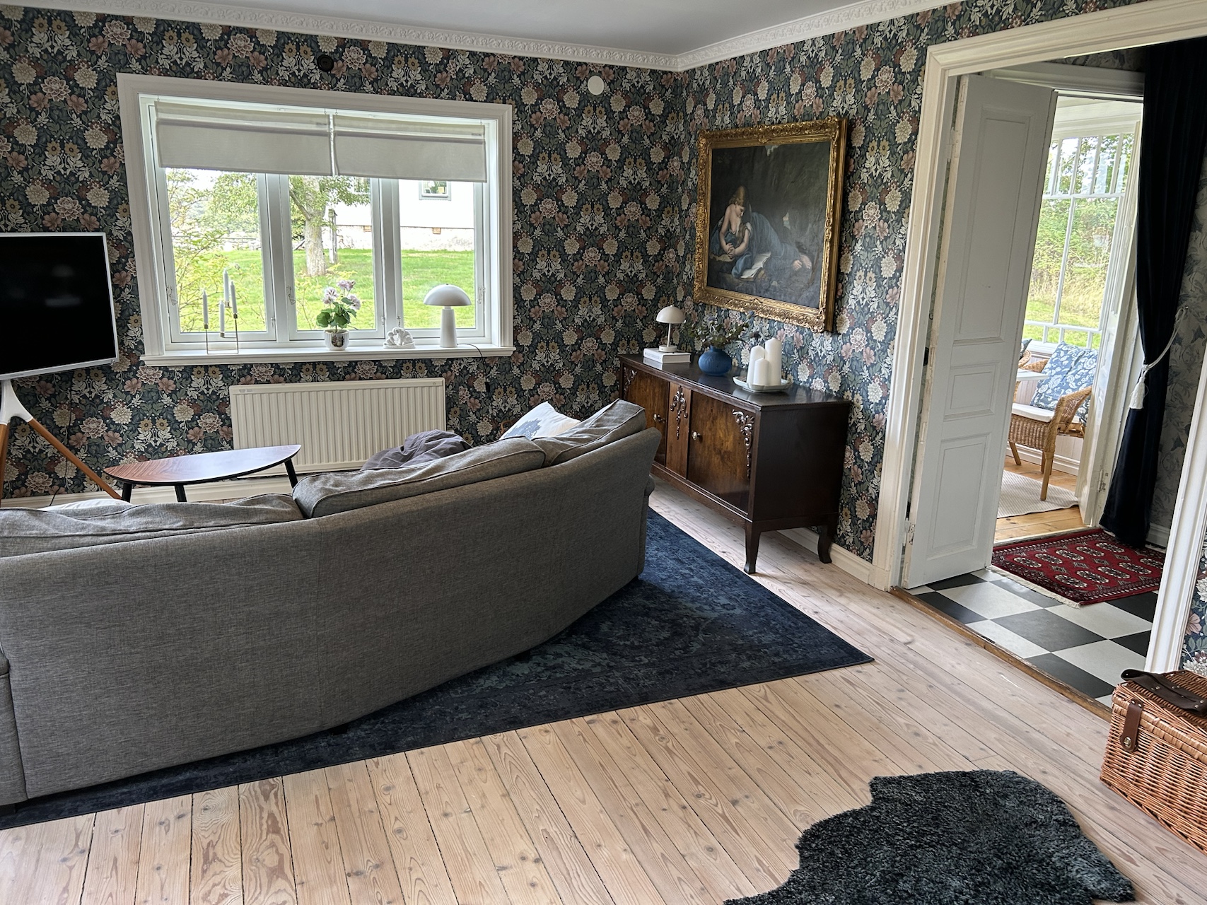 Living room with sofa and wood-burning stove